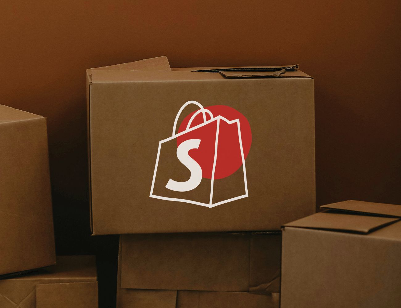 Moving boxes with Shopify logo